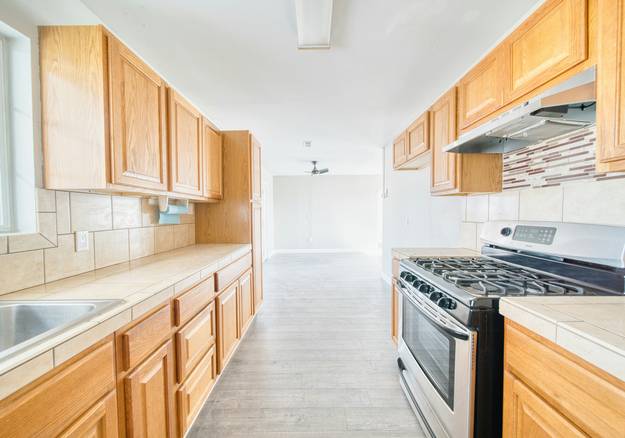 Arizona rental move out with packed boxes and keys on kitchen counter